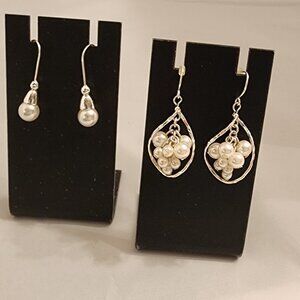 Womens costume jewelry silver tone pearl earrings.